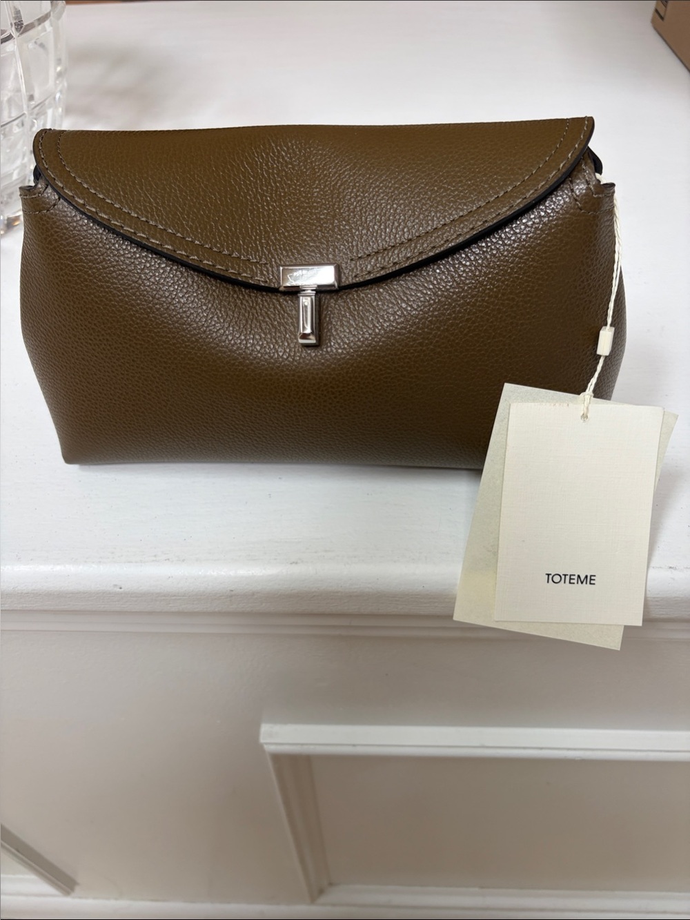 Toteme Dark Taupe Leather Pebbled Clutch with Silver-Tone T Closure .